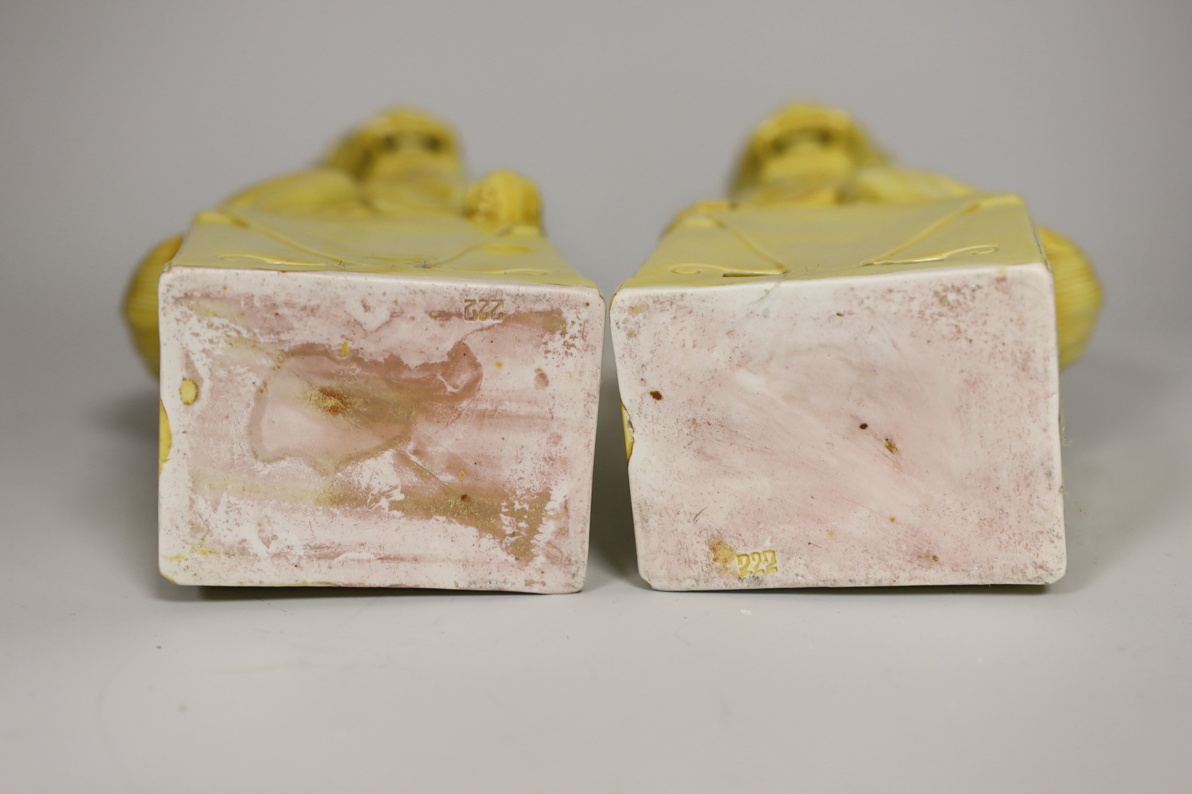 A pair of Chinese yellow glazed temple lion dogs 30cm